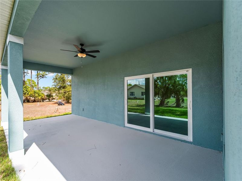 Exterior details and patio area of a home in , North Port (Image 24).