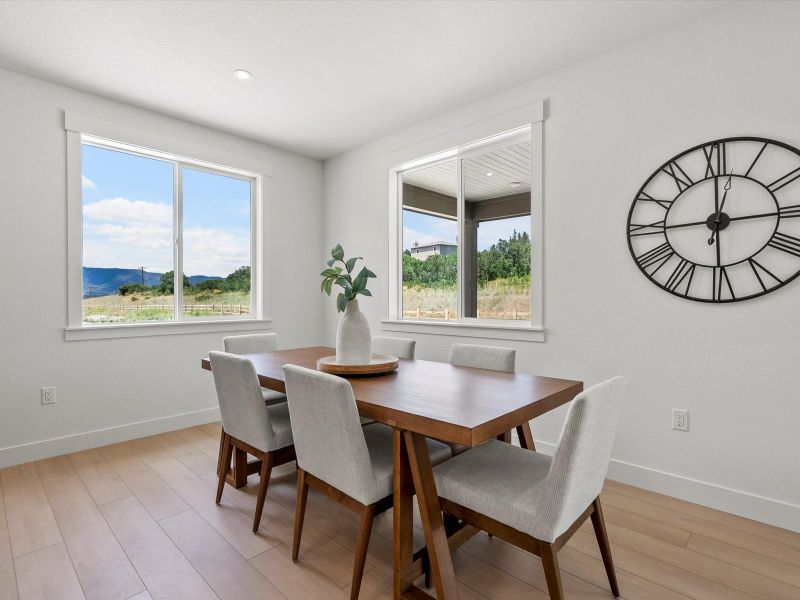 Representative furnished interior of a home built from the Reese by Lokal Homes in Jackson Creek, Monument (Image 6).