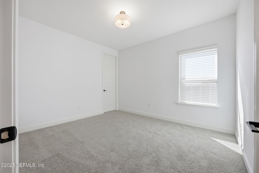 Spacious, unfurnished interior of a new home in Silver Landing At Silverleaf, St. Augustine (Image 32).