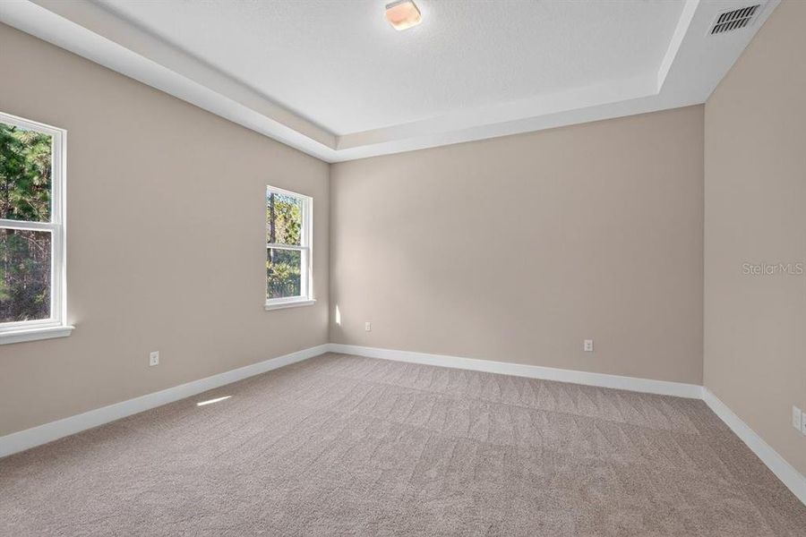 Spacious, unfurnished interior of a new home in Gray Hawk at Hole Two, Daytona Beach (Image 42).