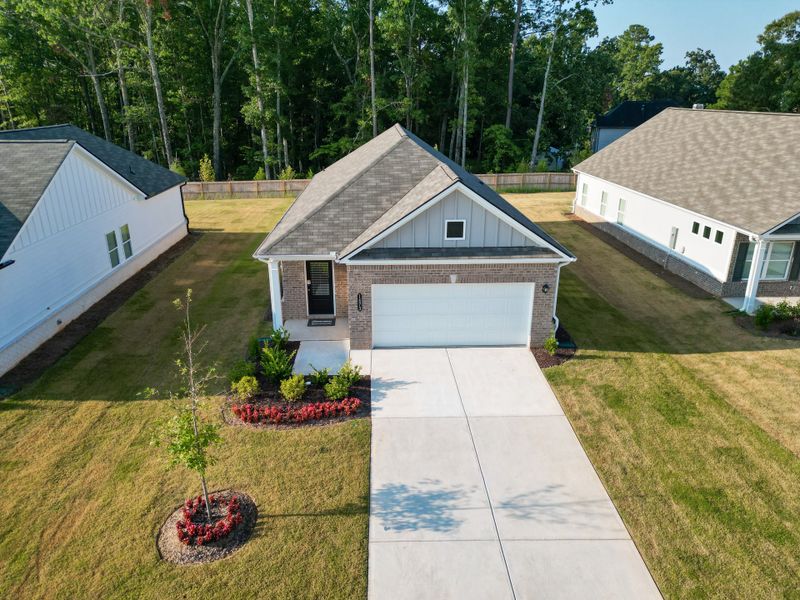 Front exterior of a new home in Trellis Park, Hampton, GA, highlighting curb appeal (Image 17).