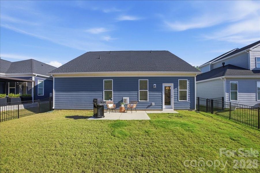 Exterior details and patio area of a home in The Terraces at Cramerton Mills, Cramerton (Image 22).