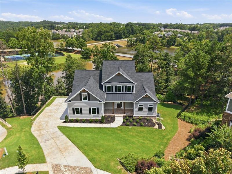 Front exterior of a new home in , Flowery Branch, GA, highlighting curb appeal (Image 28). Front exterior of a new home in , Flowery Branch, GA, highlighting curb appeal (Image 28).