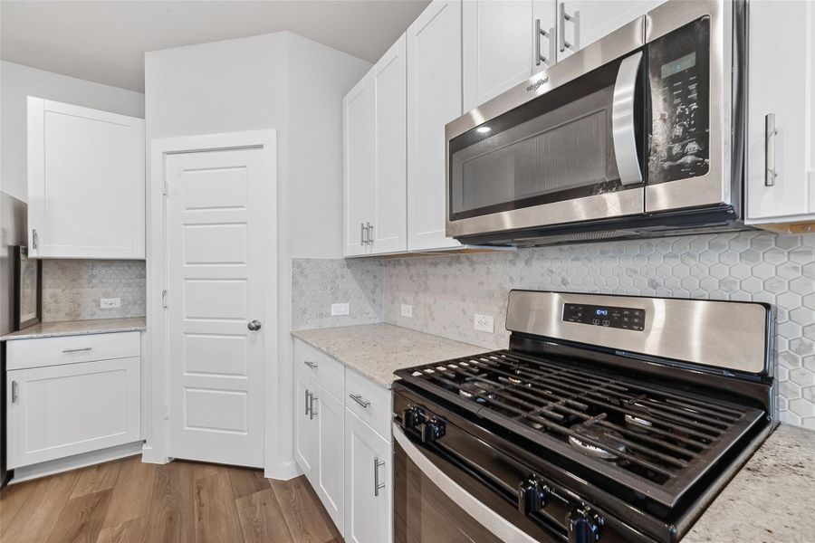 Furnished interior view inside a new home in McClendon Park Village, Houston (Image 17).