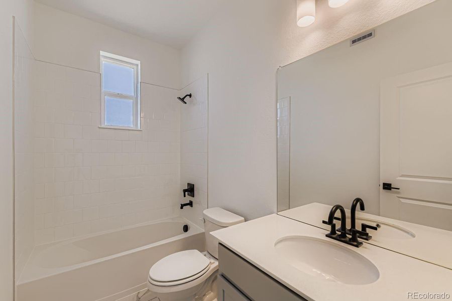 secondary bathroom with tub secondary bathroom with tub