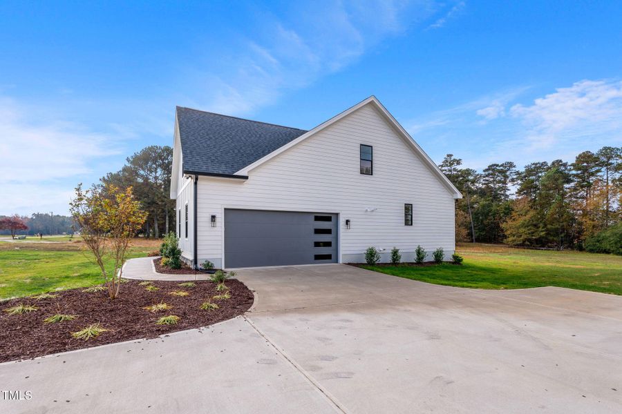 Spacious Driveway and Side entry Garage