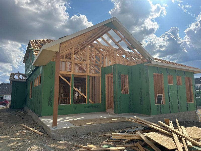 Newly framed residence showcasing a thoughtful floor plan and solid construction. Newly framed residence showcasing a thoughtful floor plan and solid construction.