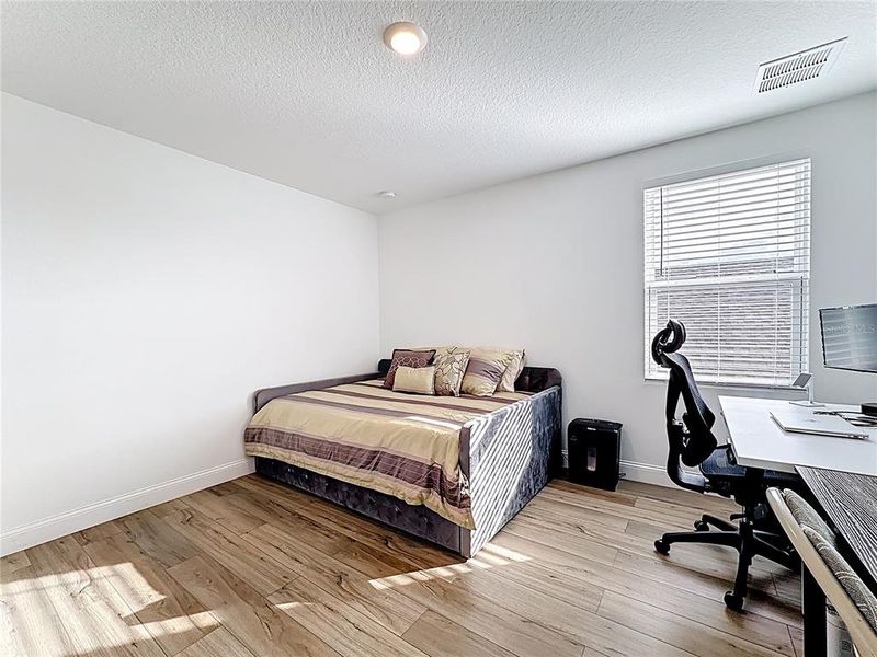 Furnished interior view inside a new home in Sunbrooke, St. Cloud (Image 49).
