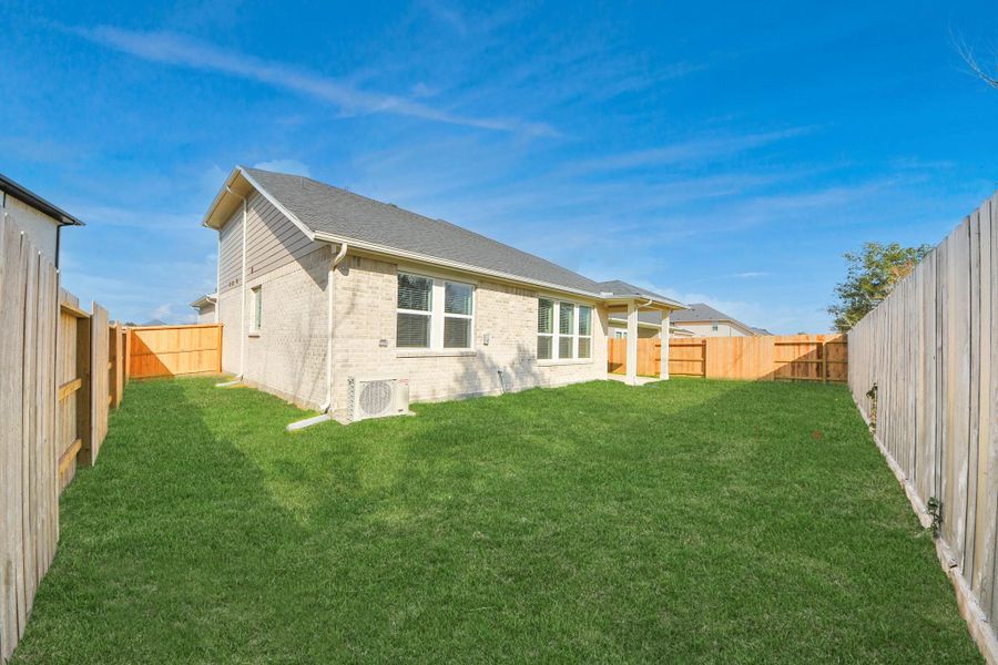 Exterior details and patio area of a home in Laurel Landing: Landmark Collection, Alvin (Image 20).
