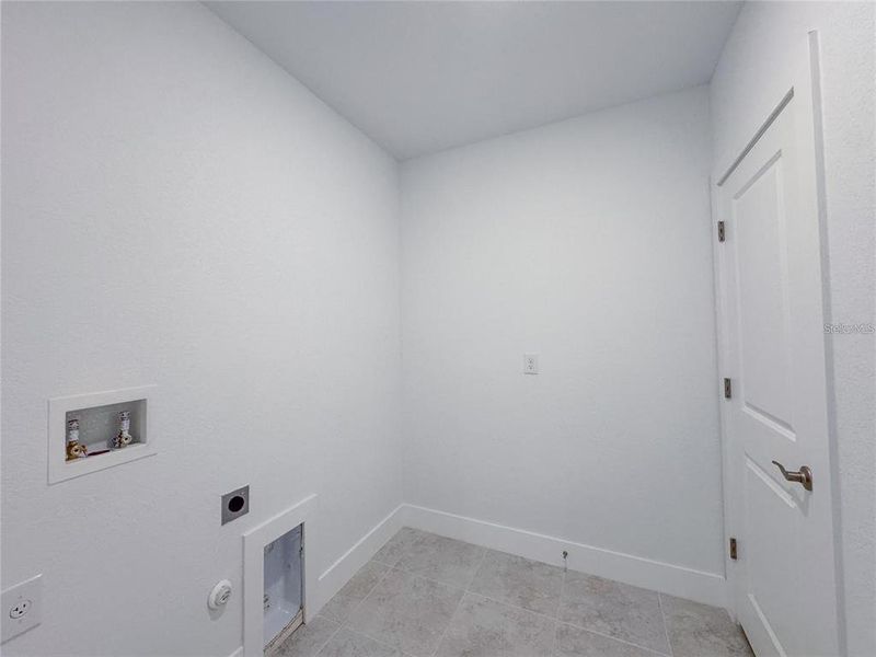Spacious, unfurnished interior of a new home in , Port Charlotte (Image 24).
