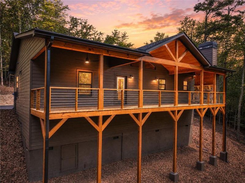 Exterior details and patio area of a home in , Ellijay (Image 25).