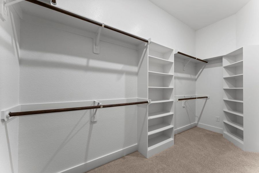 One of two Primary closets with shelving. One of two Primary closets with shelving.