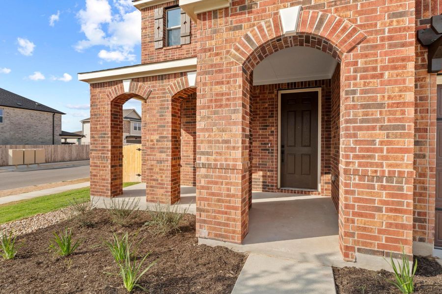 Exterior details and patio area of a home in River Bluff, Leander (Image 3).
