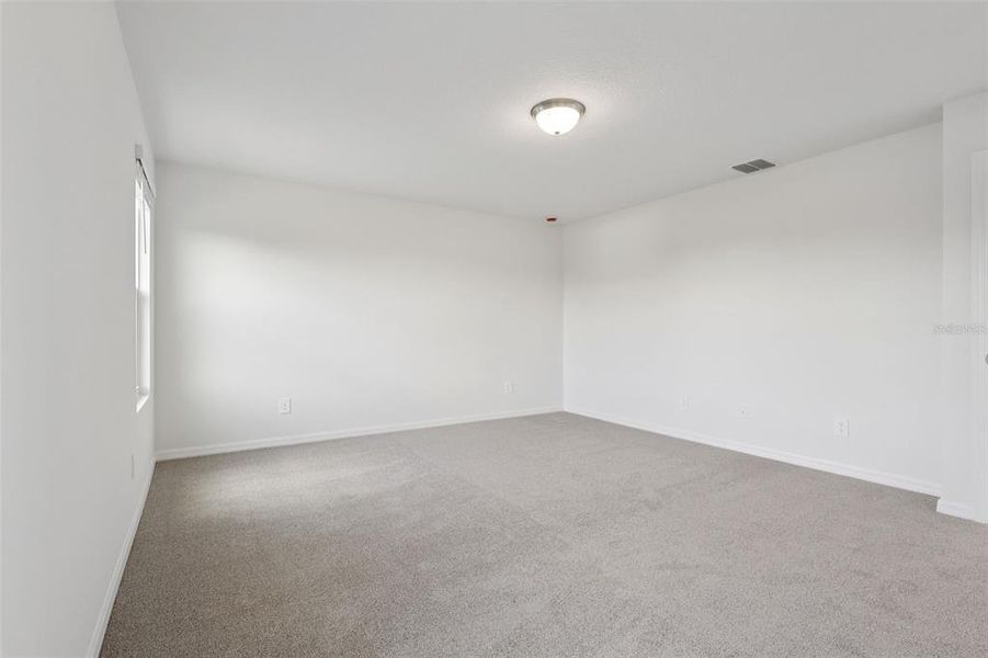 Spacious, unfurnished interior of a new home in Crosswinds - Signature Series, Haines City (Image 30).