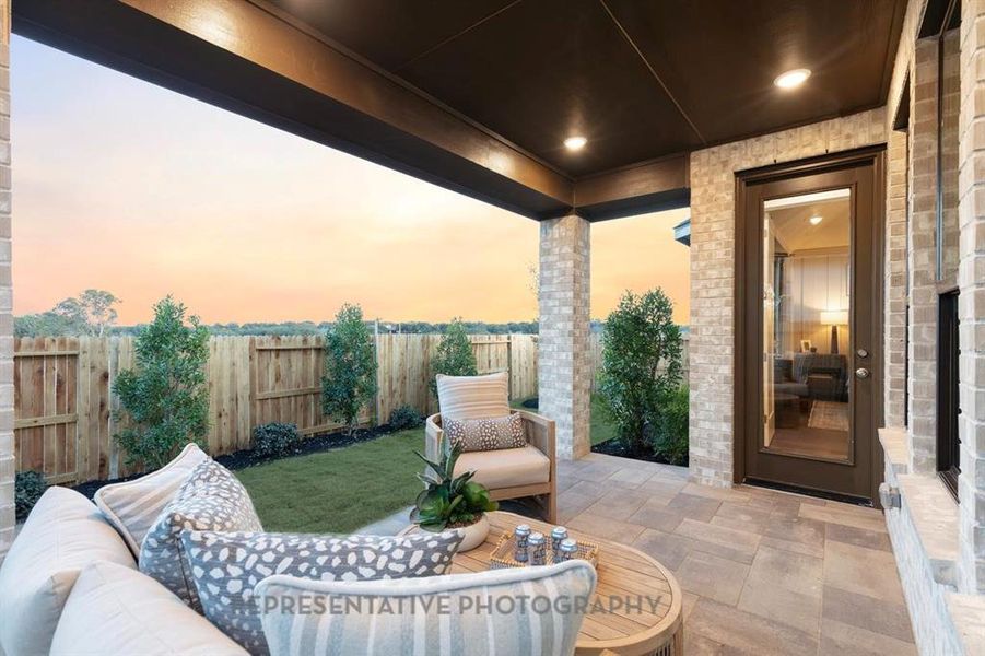 Exterior details and patio area of a home in Treeline, Justin (Image 2).