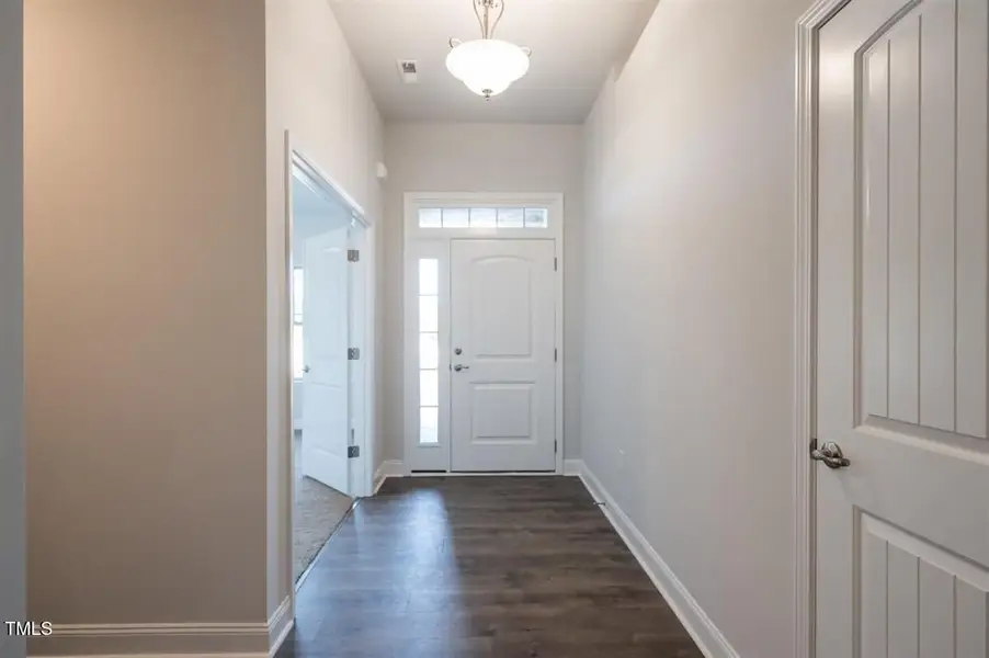 Representative unfurnished interior of a home built from the 2316 by Adams Homes in Hidden Pines, Cameron (Image 8).