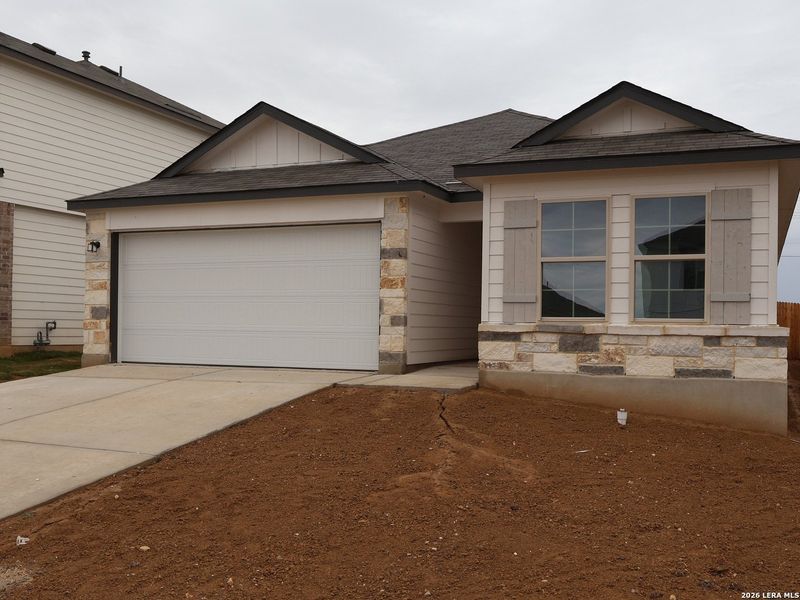 Front exterior of a new home in Agave, San Antonio, TX, highlighting curb appeal (Image 2). Front exterior of a new home in Agave, San Antonio, TX, highlighting curb appeal (Image 2).