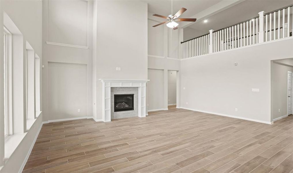 Cozy fireplace in great room (*Photo not of actual home and used for illustration purposes only.)