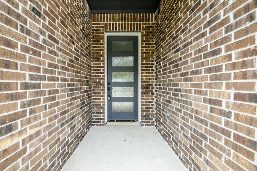Exterior details and patio area of a home in , Livingston (Image 3).