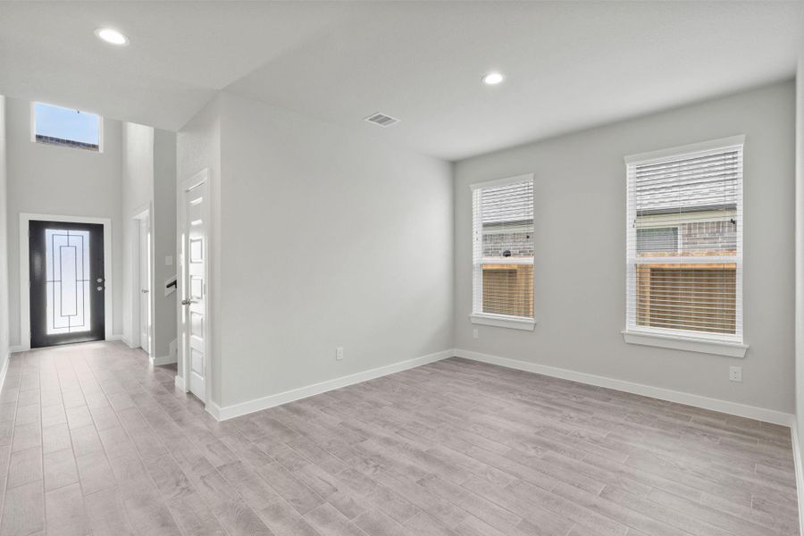 Make memories gathered around the table with your family and friends! This dining spacious room features elegant flooring custom paint, and immediately adjacent to kitchen for open concept feel. Sample photo of completed home. As-built color and selections may vary. Make memories gathered around the table with your family and friends! This dining spacious room features elegant flooring custom paint, and immediately adjacent to kitchen for open concept feel. Sample photo of completed home. As-built color and selections may vary.