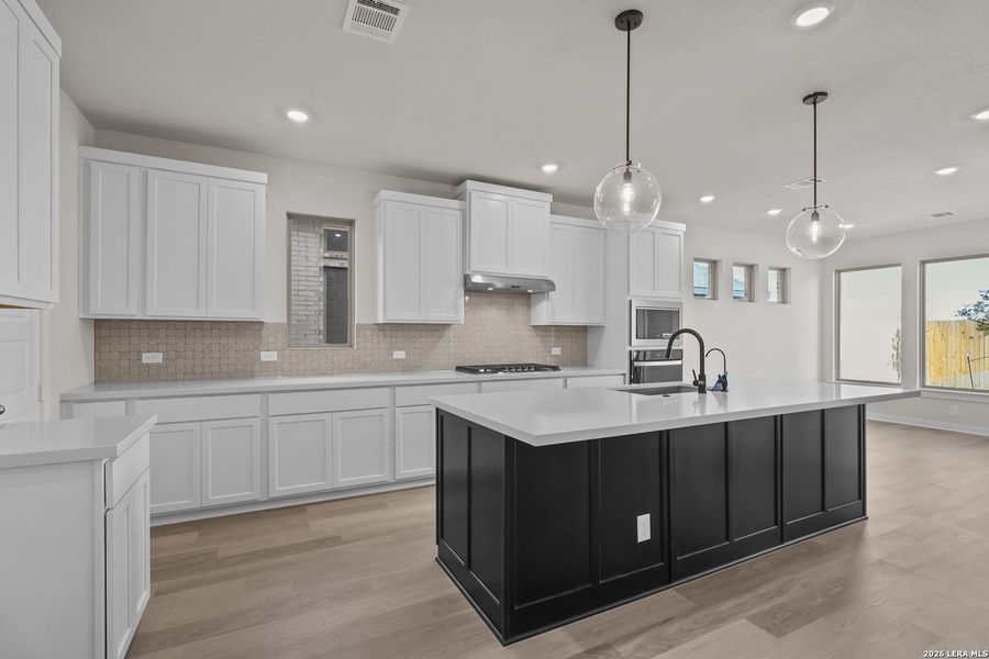 Furnished interior view inside a new home in Nopal Valley, San Antonio (Image 7).
