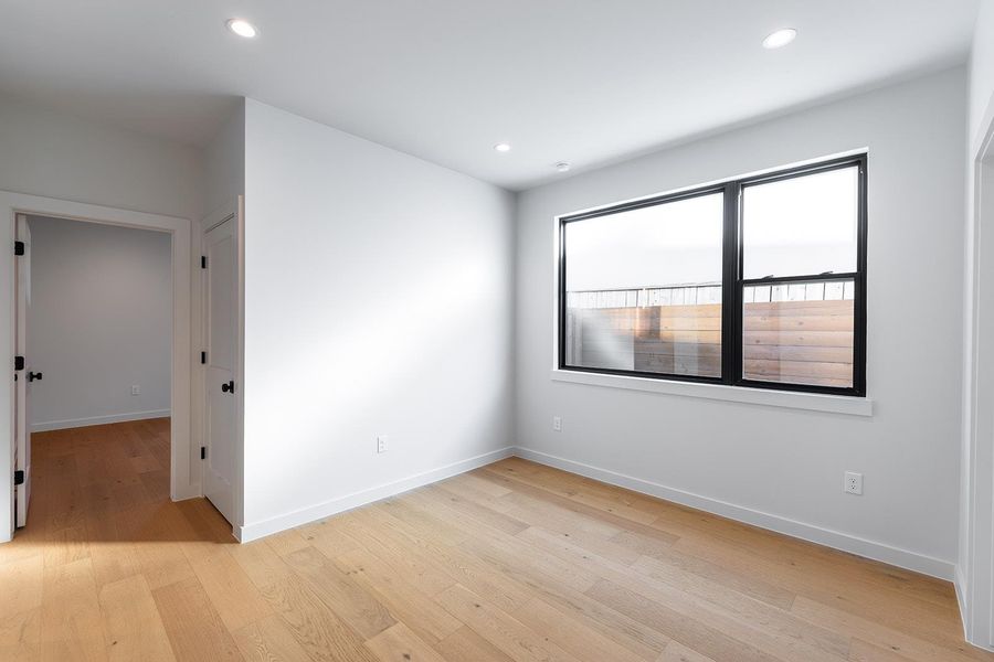 Unfurnished room featuring recessed lighting and light wood-type flooring