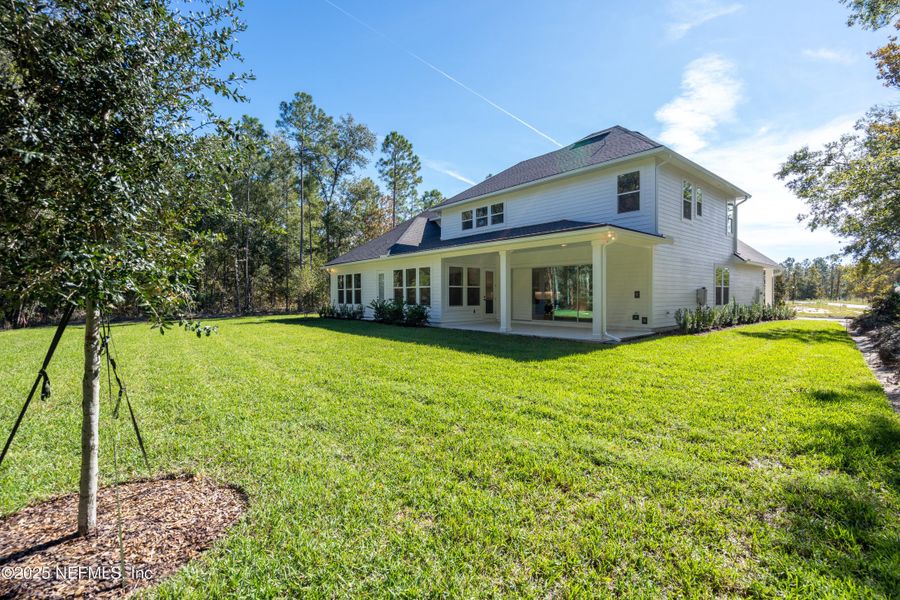 Exterior details and patio area of a home in SilverLeaf, St. Augustine (Image 27).