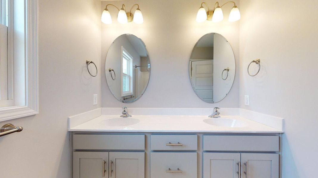 Representative furnished interior of a home built from the Tyler A by JC Jackson Homes,LLC in Heritage Pointe, Newport (Image 12).
