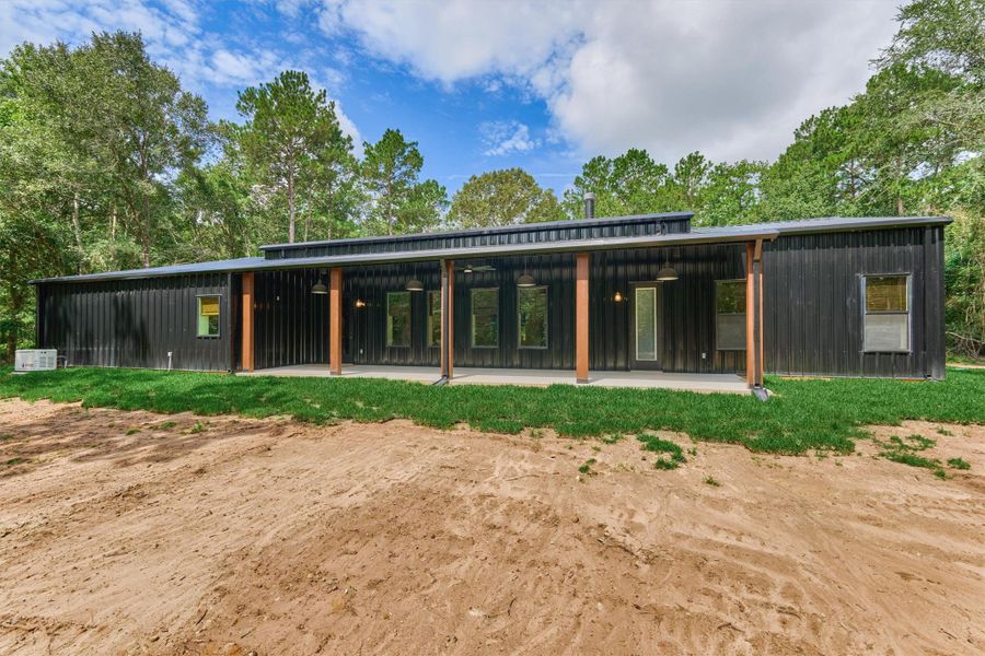 45 ft. long covered back porch offers plenty of space for guests to gather and relax