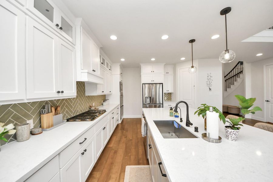 Spacious layout with large island and abundant counter space.