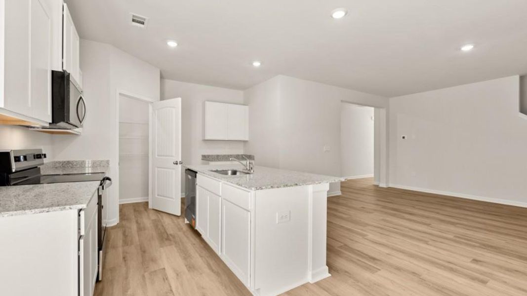 Furnished interior view inside a new home in Rolling Meadows, Jasper (Image 5).
