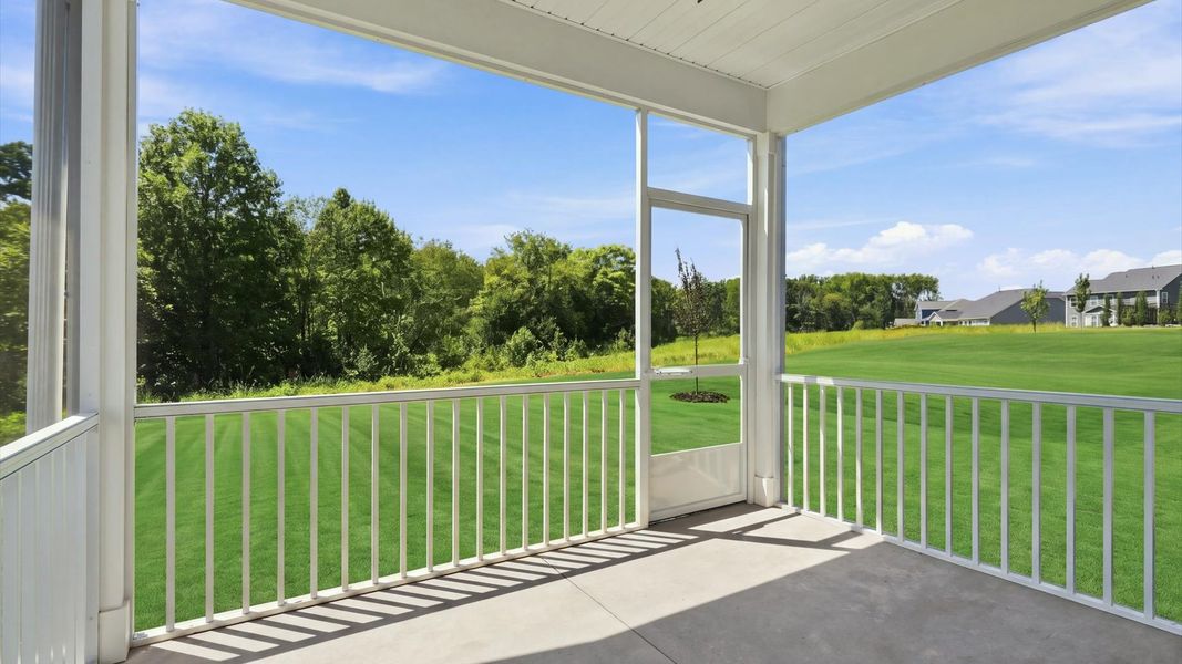 Established charm meets functional outdoor living with a spacious rear screened-in porch