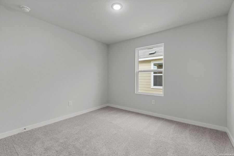 Spacious, unfurnished interior of a new home in Hacienda, San Antonio (Image 13).