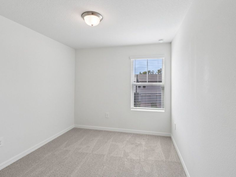 Spacious, unfurnished interior of a new home in Cagan Crossings West, Clermont (Image 11).