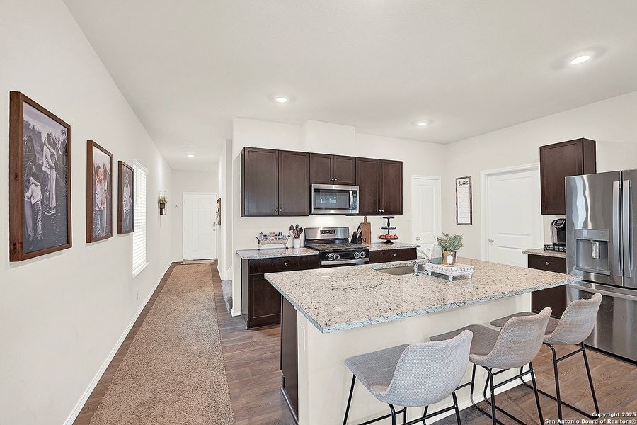 Furnished interior view inside a new home in The Links at River Bend, Floresville (Image 5).