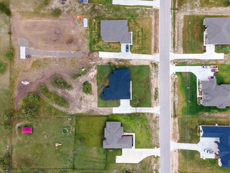 Aerial view of property and surrounding area featuring nearby area Aerial view of property and surrounding area featuring nearby area