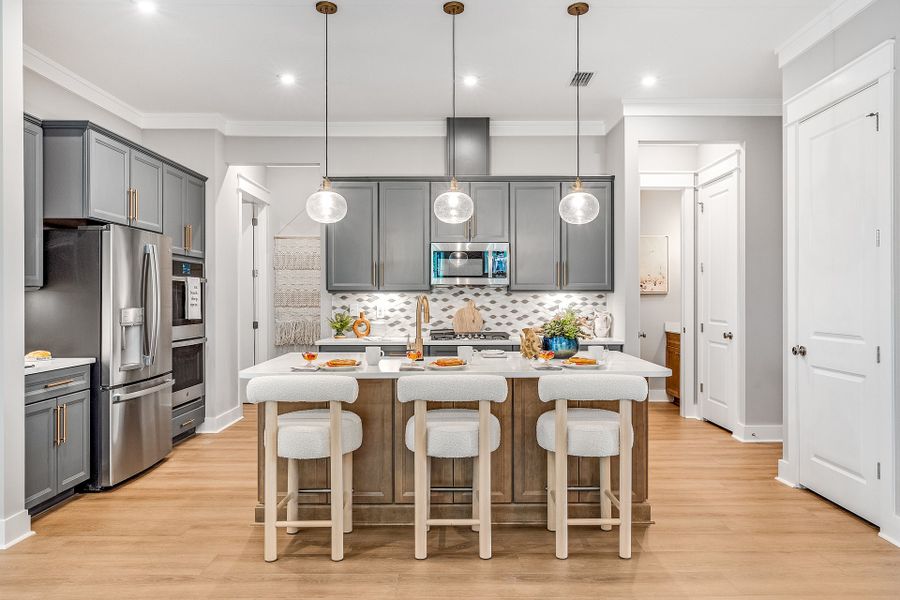 Representative furnished interior of a home built from the Anfield by Fischer Homes in The Villas at Longleaf Park, a Watersound Origins® community, Inlet Beach (Image 9).