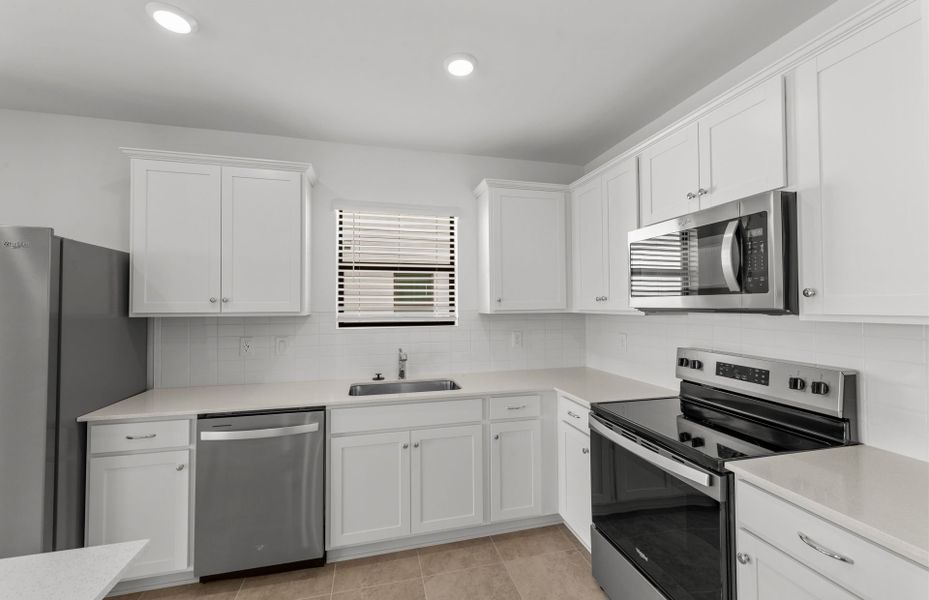 Furnished interior view inside a new home in Whispering Lakes, Lehigh Acres (Image 13).