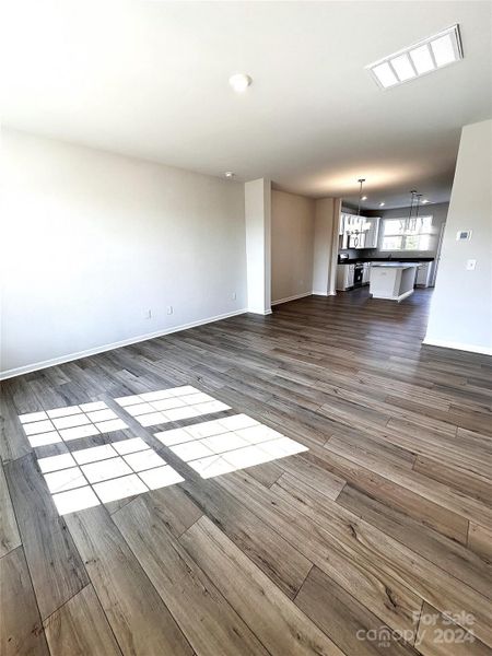 Digital Similar Image- Living room opens into the dining room and gourmet kitchen