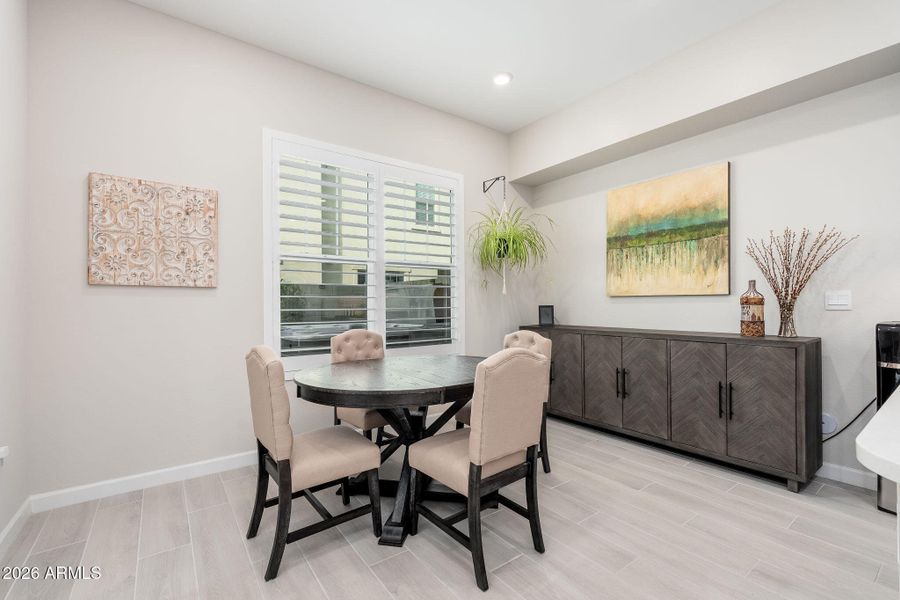 Dining with backyard view