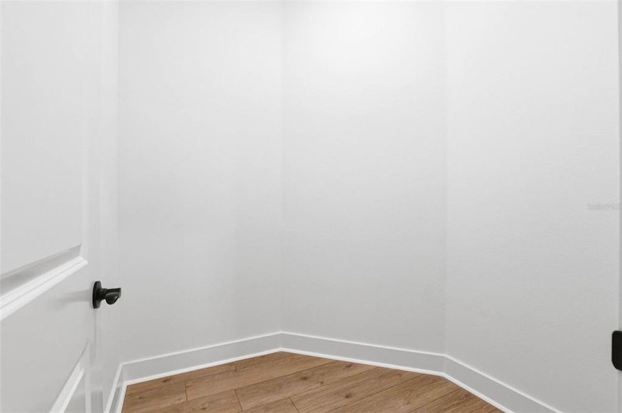 Spacious, unfurnished interior of a new home in Vida's Way, Wesley Chapel (Image 50).