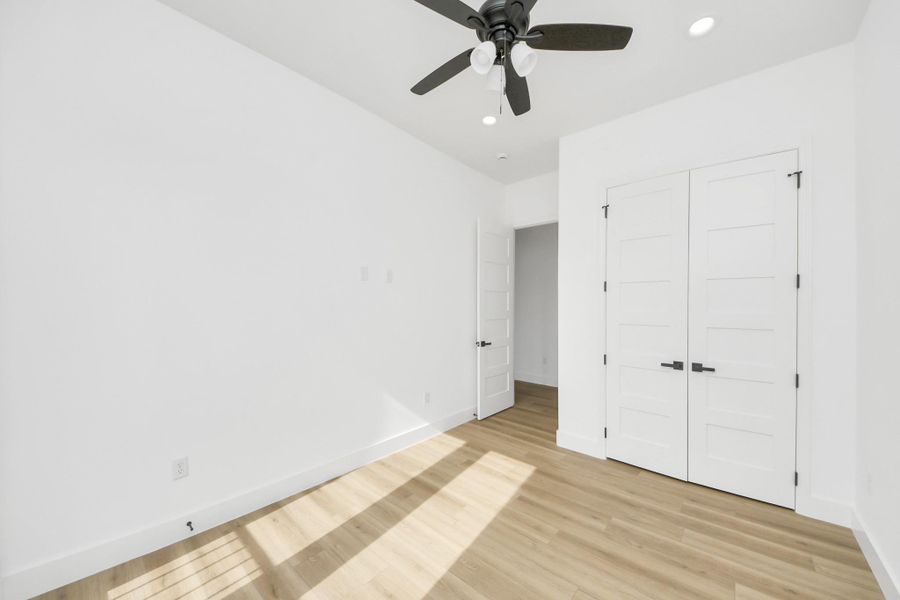 Guest bedroom w/ large closet space. Guest bedroom w/ large closet space.