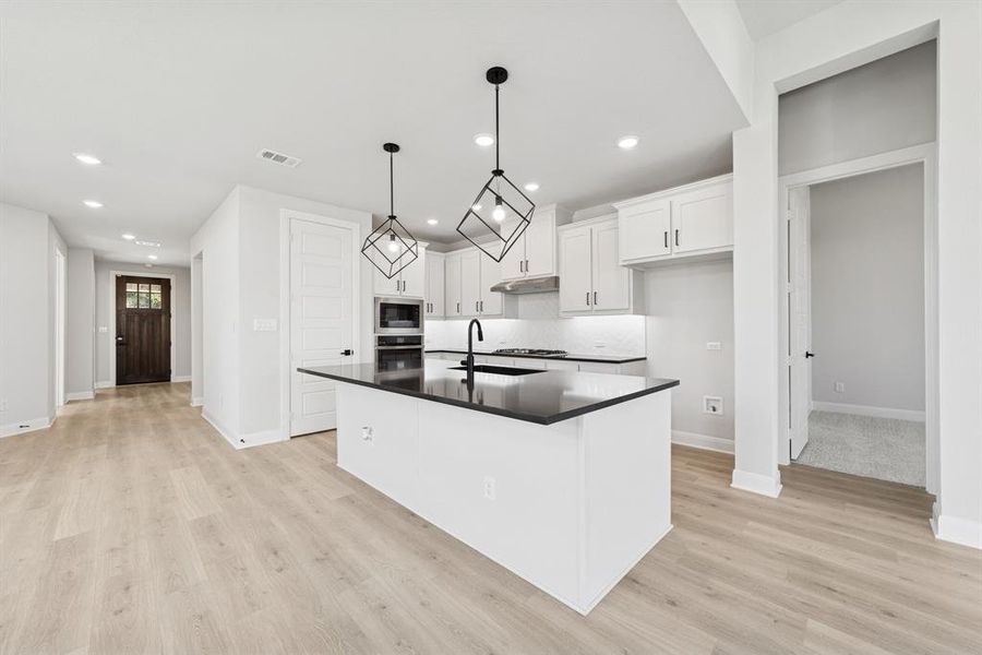 Furnished interior view inside a new home in Mantua Point Classics, Van Alstyne (Image 15). Furnished interior view inside a new home in Mantua Point Classics, Van Alstyne (Image 15).