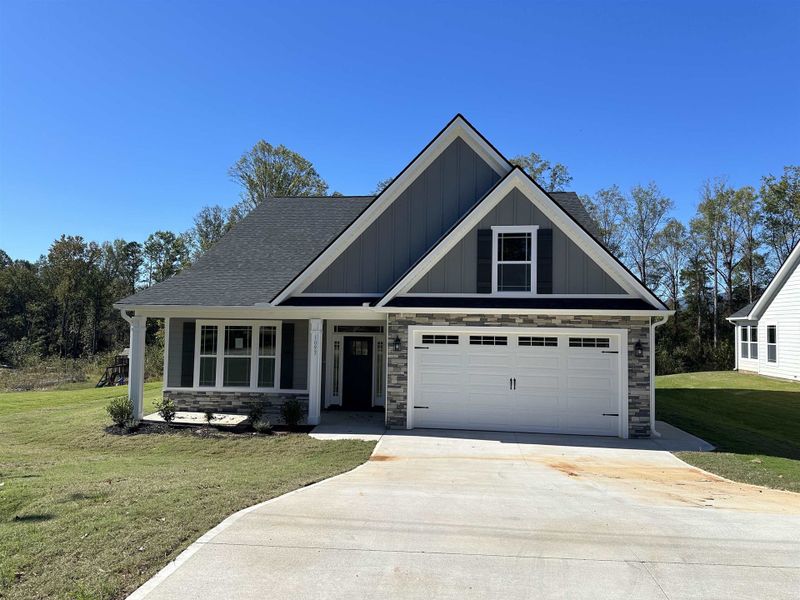 Front exterior of a new home in Weston, Campobello, SC, highlighting curb appeal (Image 1).