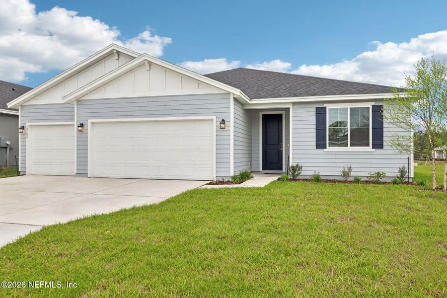 Front exterior of a new home in Azalea Creek, Jacksonville, FL, highlighting curb appeal (Image 1). Front exterior of a new home in Azalea Creek, Jacksonville, FL, highlighting curb appeal (Image 1).