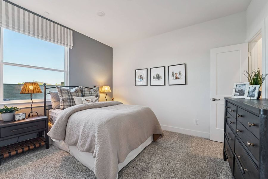 Furnished interior view inside a new home in Bridgeland, Cypress (Image 32).