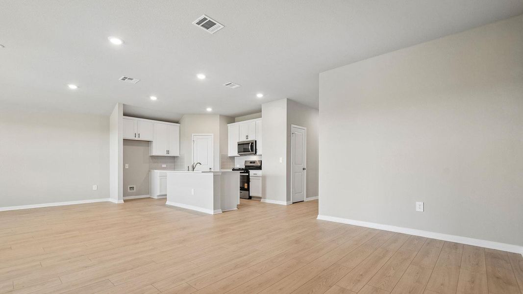 Spacious, unfurnished interior of a new home in Carillon, Manor (Image 21).