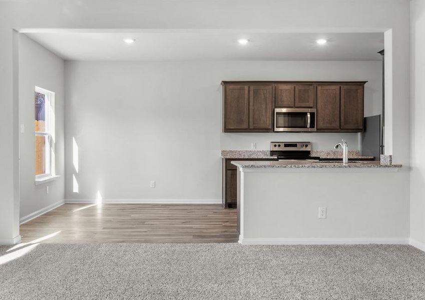 The dining room of the Cypress floor plan has a window that lets in great, natural light.