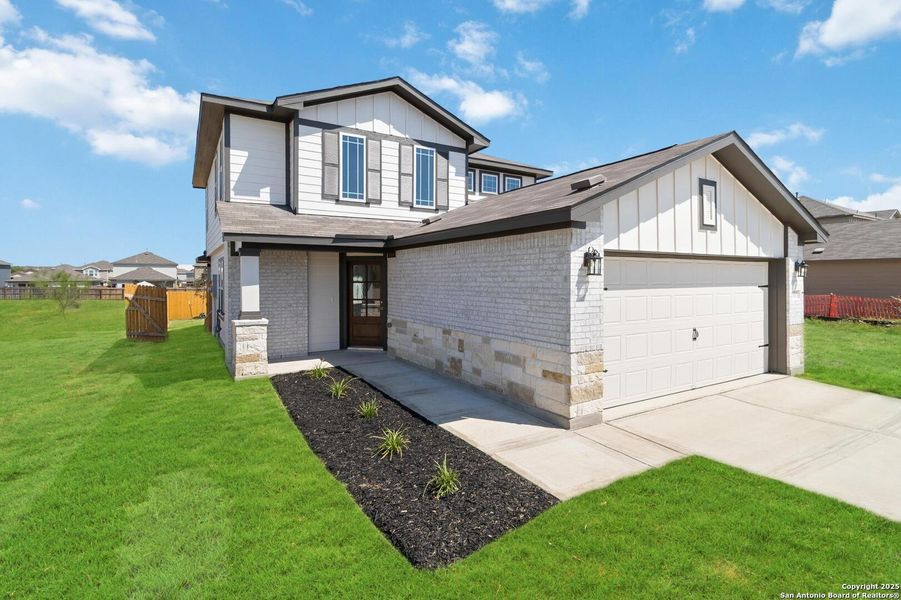 Front exterior of a new home in Willow Point, San Antonio, TX, highlighting curb appeal (Image 17). Front exterior of a new home in Willow Point, San Antonio, TX, highlighting curb appeal (Image 17).