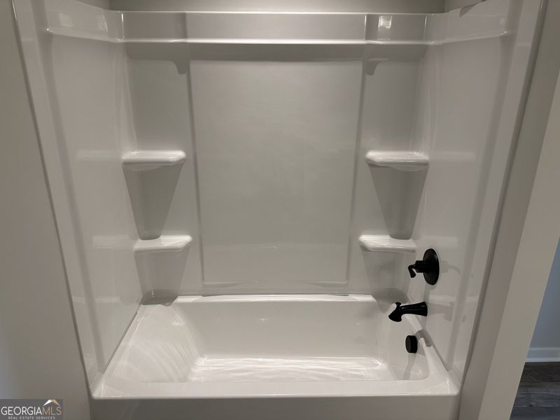 Furnished interior view inside a new home in Rosewood Lake Estates, Hoschton (Image 65).